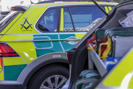 Metropolitan Grand Master presents three rapid response cars to the London Ambulance Service